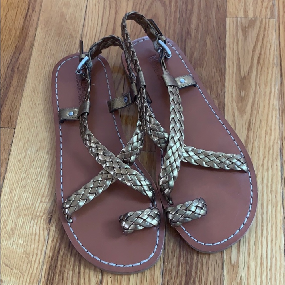 Michael Kors gladiator sandals.